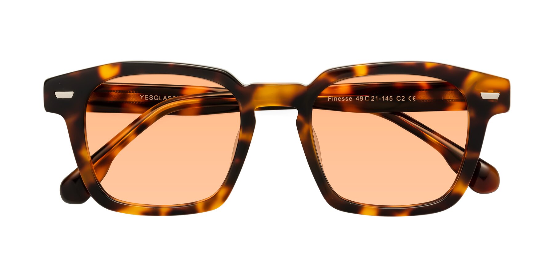 Folded Front of Finesse in Tortoise with Light Orange Tinted Lenses