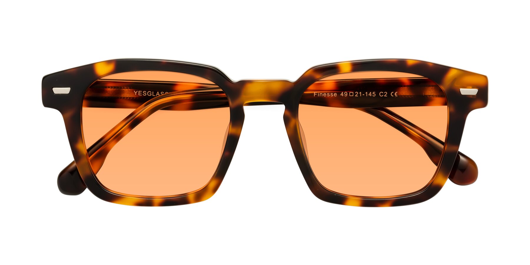 Folded Front of Finesse in Tortoise with Medium Orange Tinted Lenses