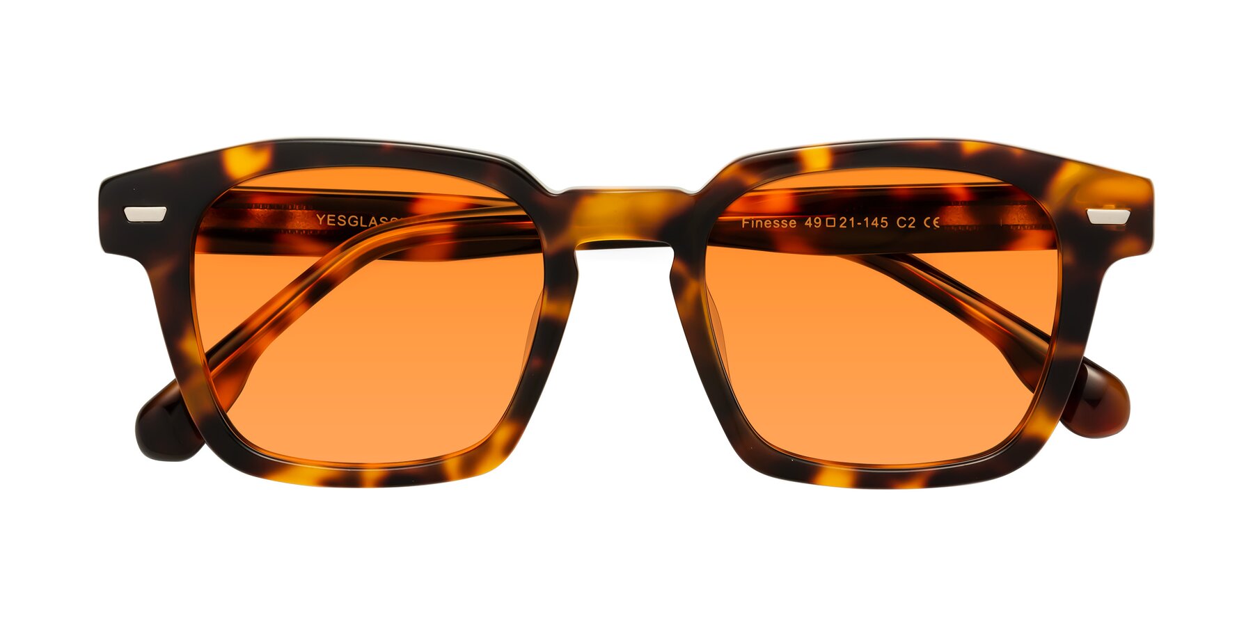 Folded Front of Finesse in Tortoise with Orange Tinted Lenses