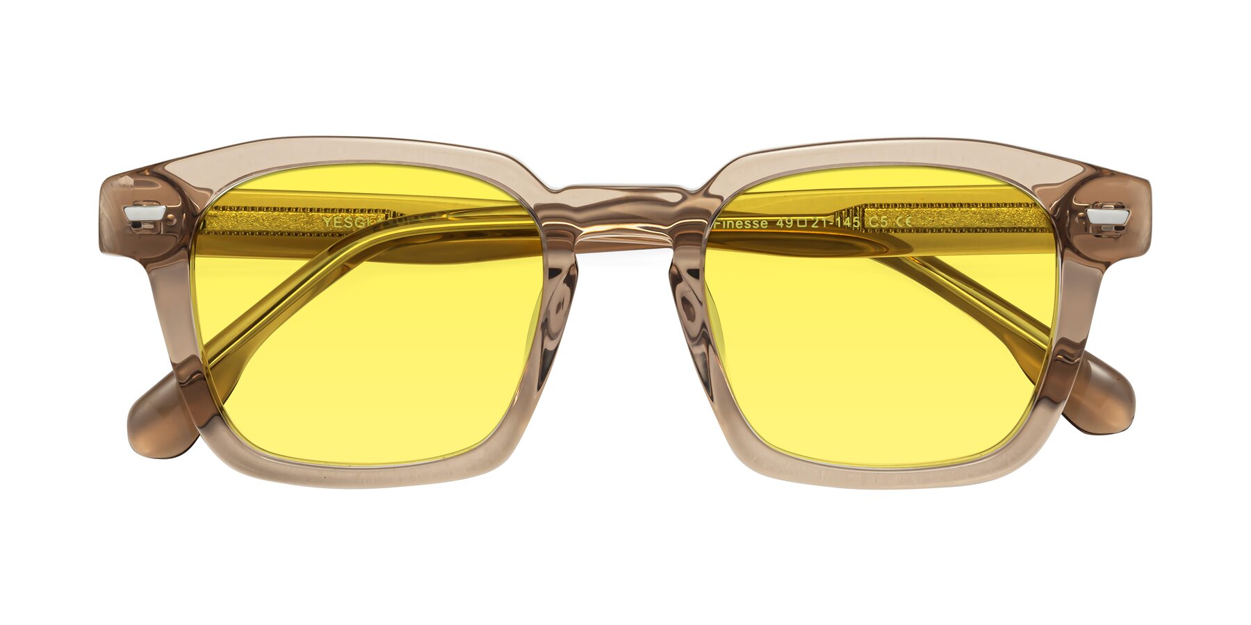 Folded Front of Finesse in Champagne with Medium Yellow Tinted Lenses