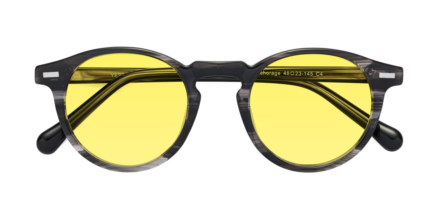 Folded Front of Anchorage in Striped Gray with Medium Yellow Tinted Lenses