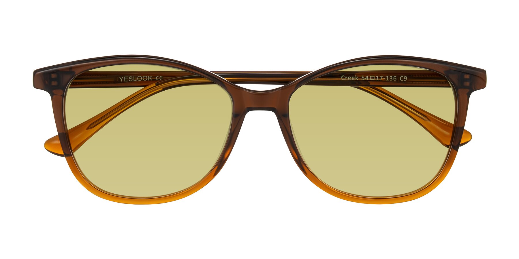 Folded Front of Creek in Gradient Brown with Medium Champagne Tinted Lenses