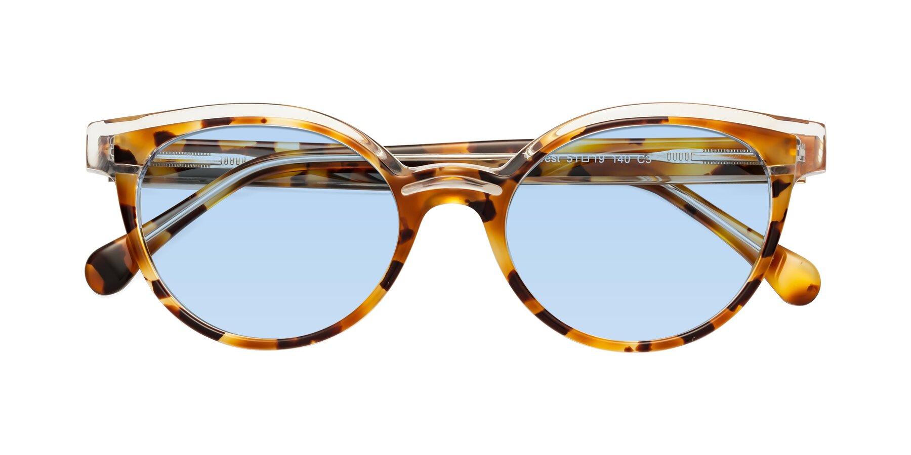 Folded Front of Forest in Ginger Tortoise with Light Blue Tinted Lenses
