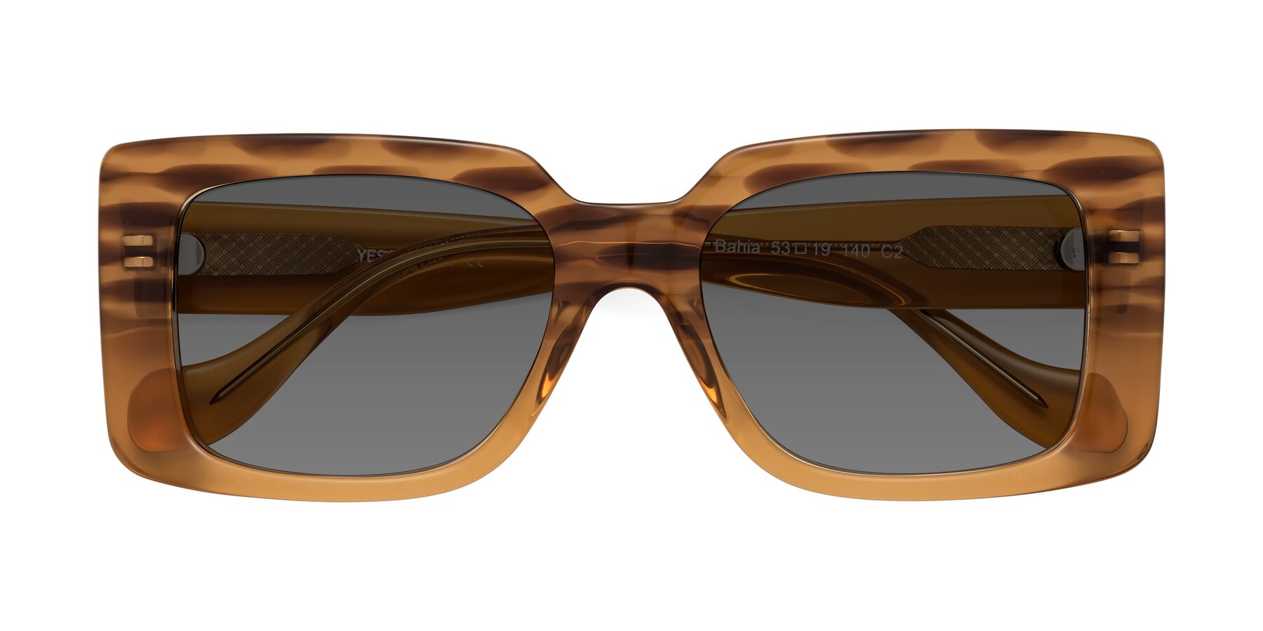 Folded Front of Bahia in Amber Striped with Medium Gray Tinted Lenses
