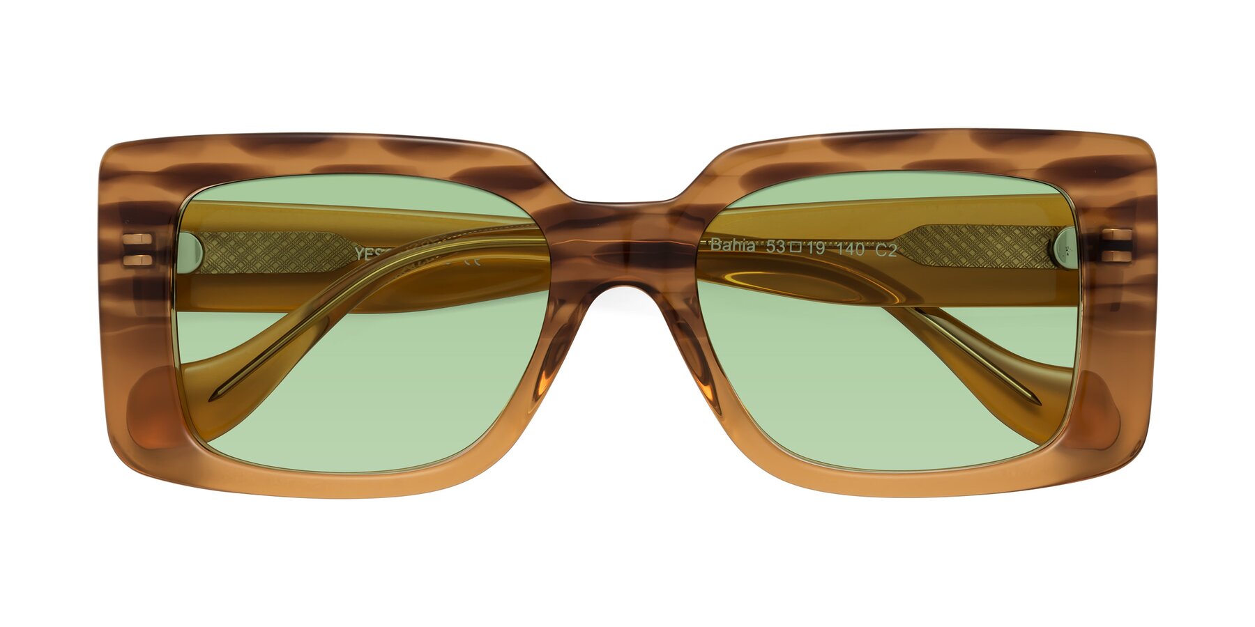 Folded Front of Bahia in Amber Striped with Medium Green Tinted Lenses