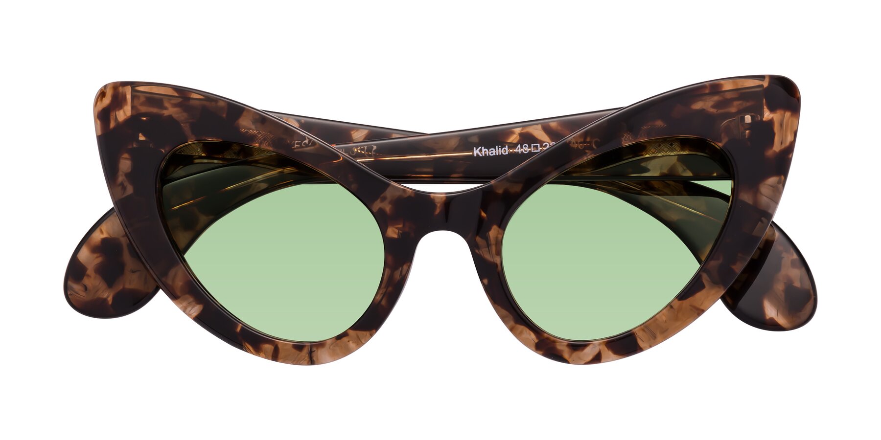 Folded Front of Khalid in Translucent Brown Tortoise with Medium Green Tinted Lenses