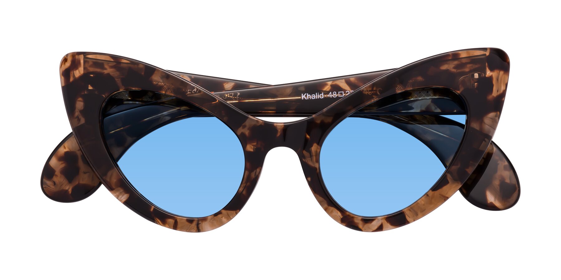 Folded Front of Khalid in Translucent Brown Tortoise with Medium Blue Tinted Lenses