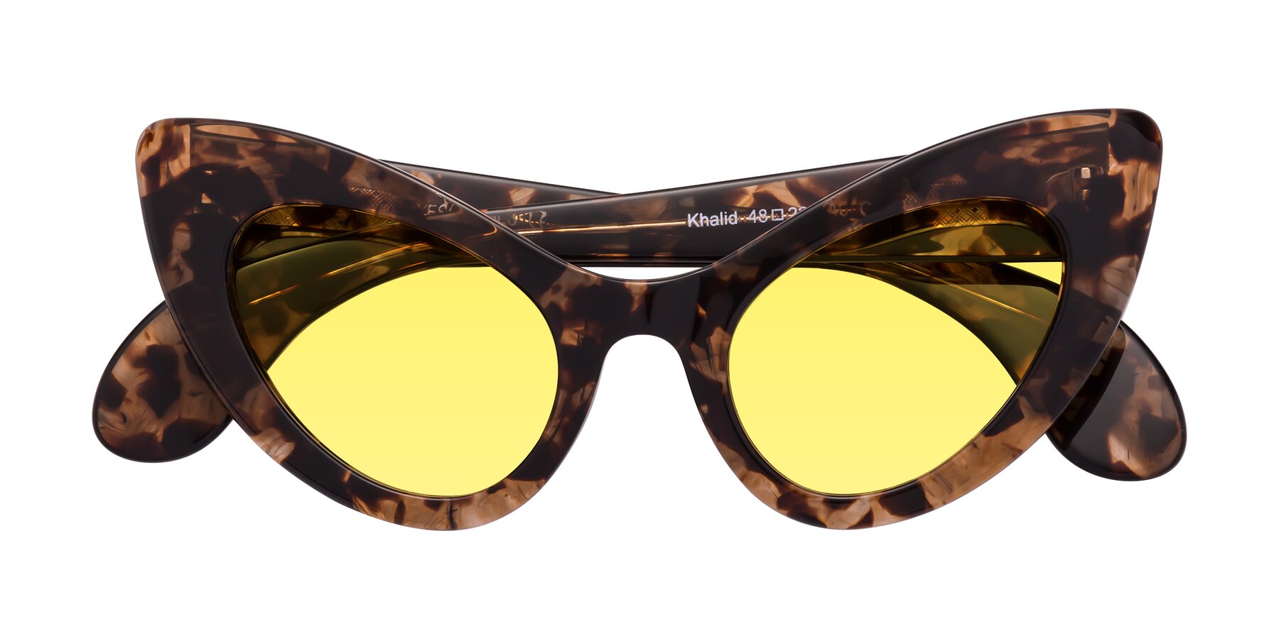 Folded Front of Khalid in Translucent Brown Tortoise with Medium Yellow Tinted Lenses