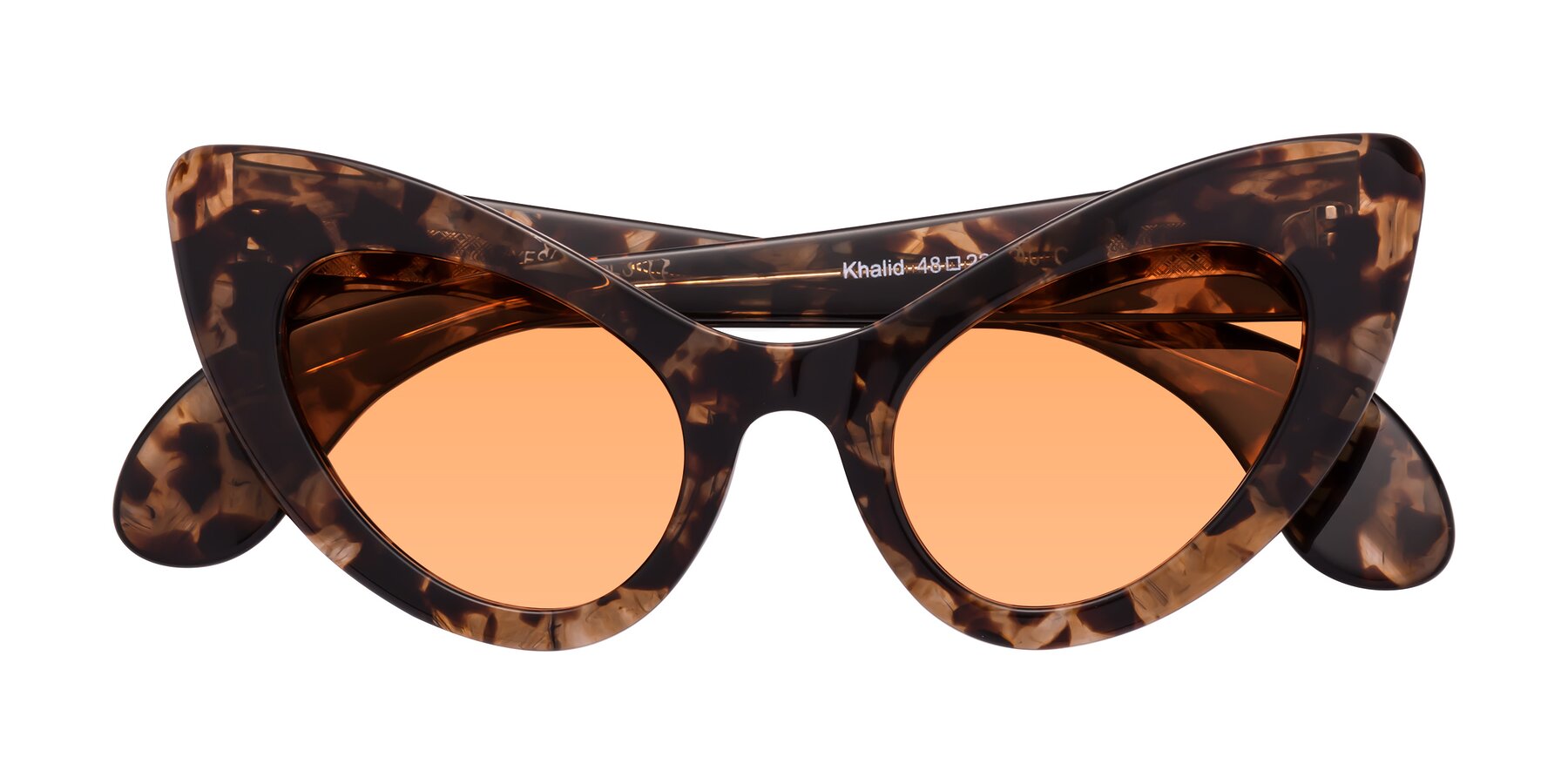 Folded Front of Khalid in Translucent Brown Tortoise with Medium Orange Tinted Lenses