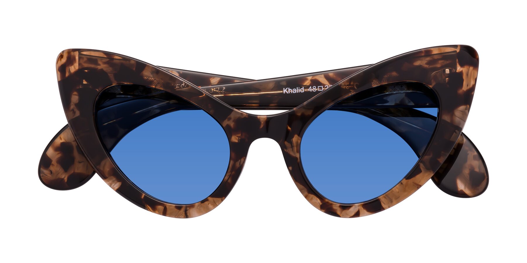 Folded Front of Khalid in Translucent Brown Tortoise with Blue Tinted Lenses