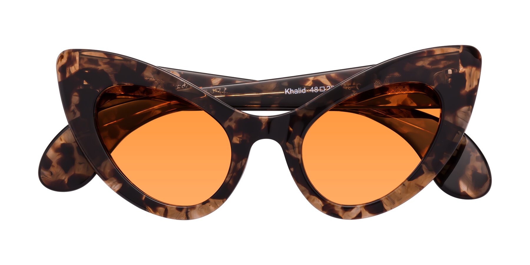 Folded Front of Khalid in Translucent Brown Tortoise with Orange Tinted Lenses