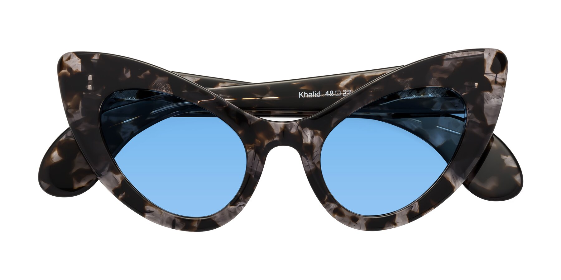 Folded Front of Khalid in Translucent Gray Tortoise with Medium Blue Tinted Lenses