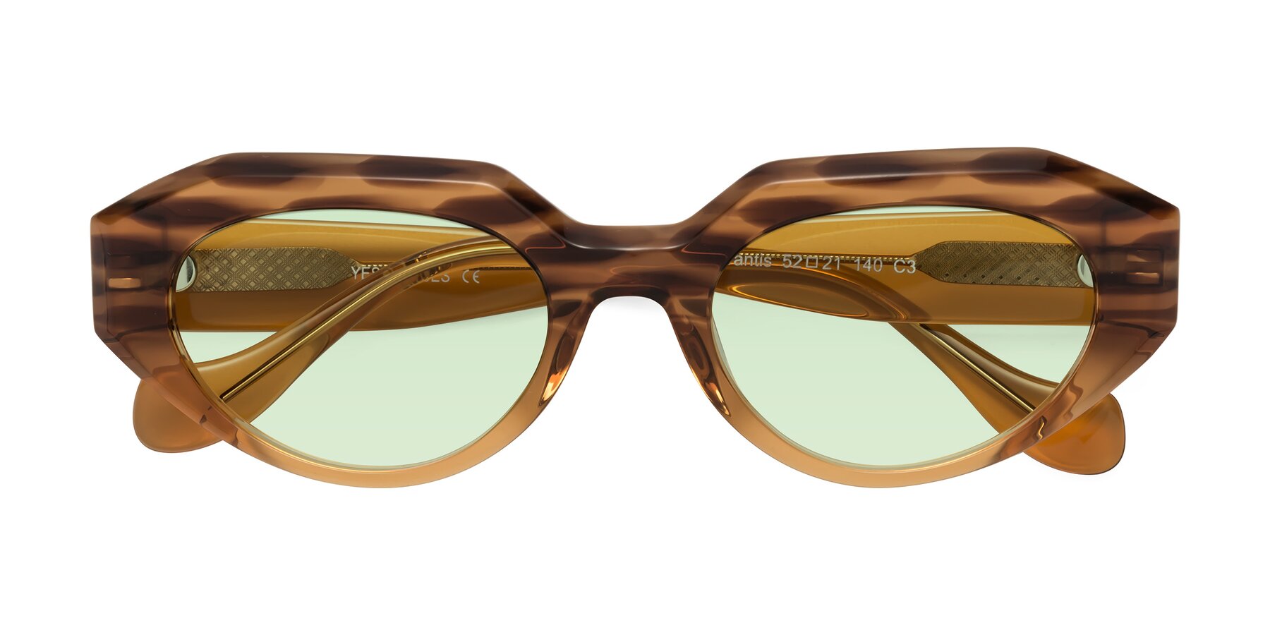 Folded Front of Vantis in Amber Striped with Light Green Tinted Lenses