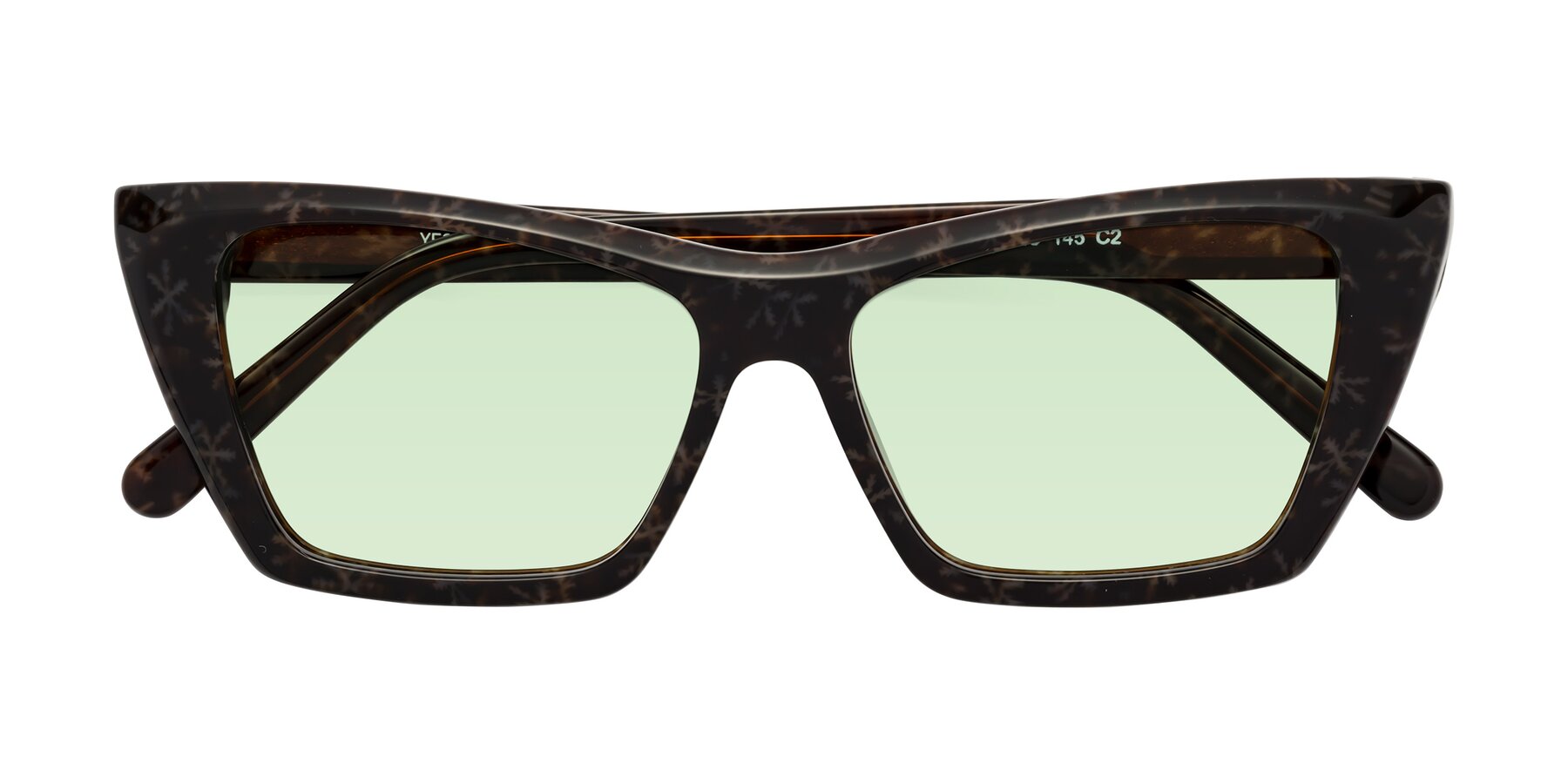 Folded Front of Khoi in Brown Snowflake with Light Green Tinted Lenses