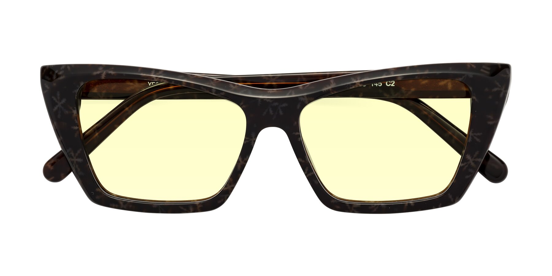 Folded Front of Khoi in Brown Snowflake with Light Yellow Tinted Lenses