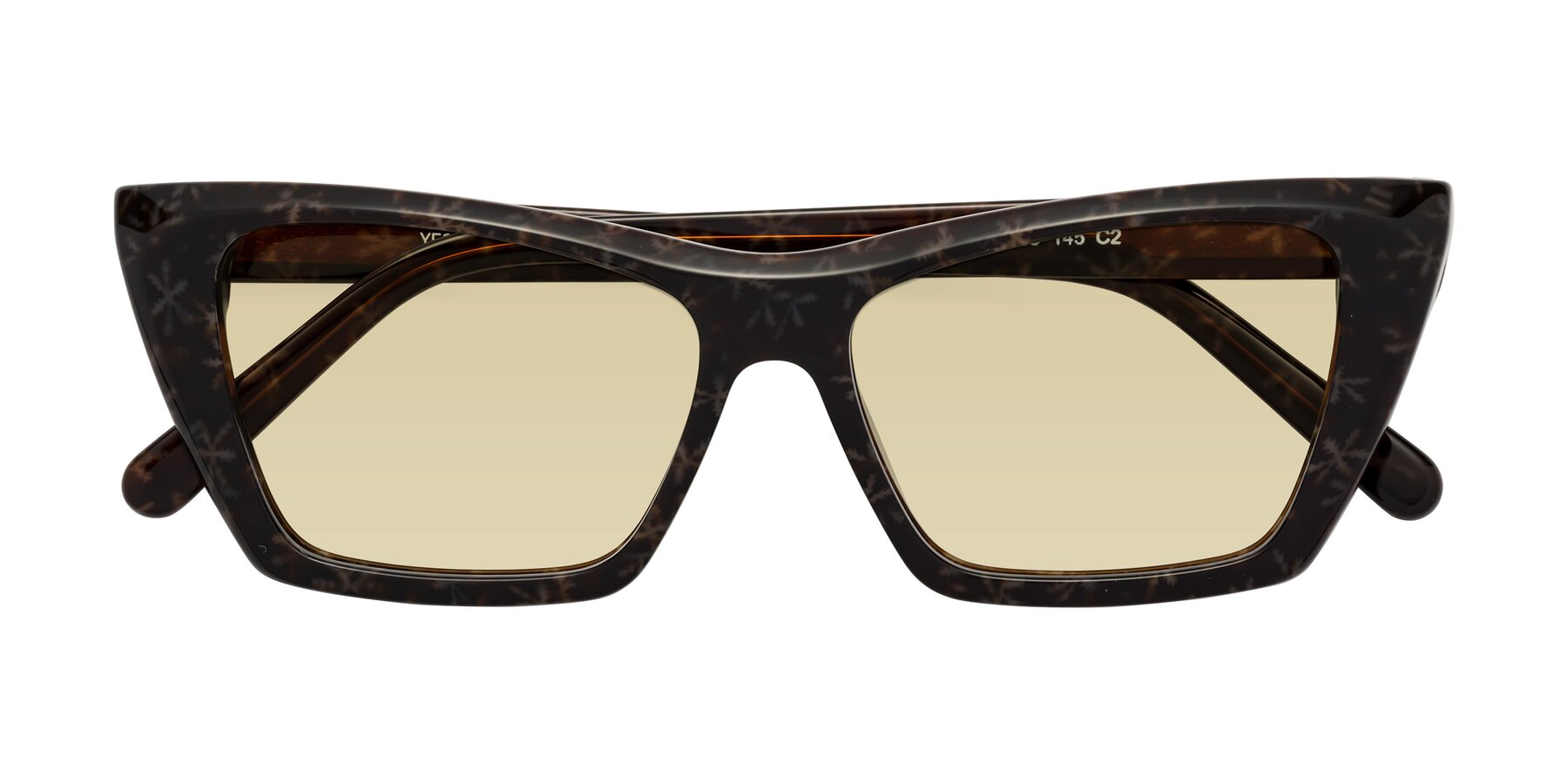 Folded Front of Khoi in Brown Snowflake with Light Champagne Tinted Lenses