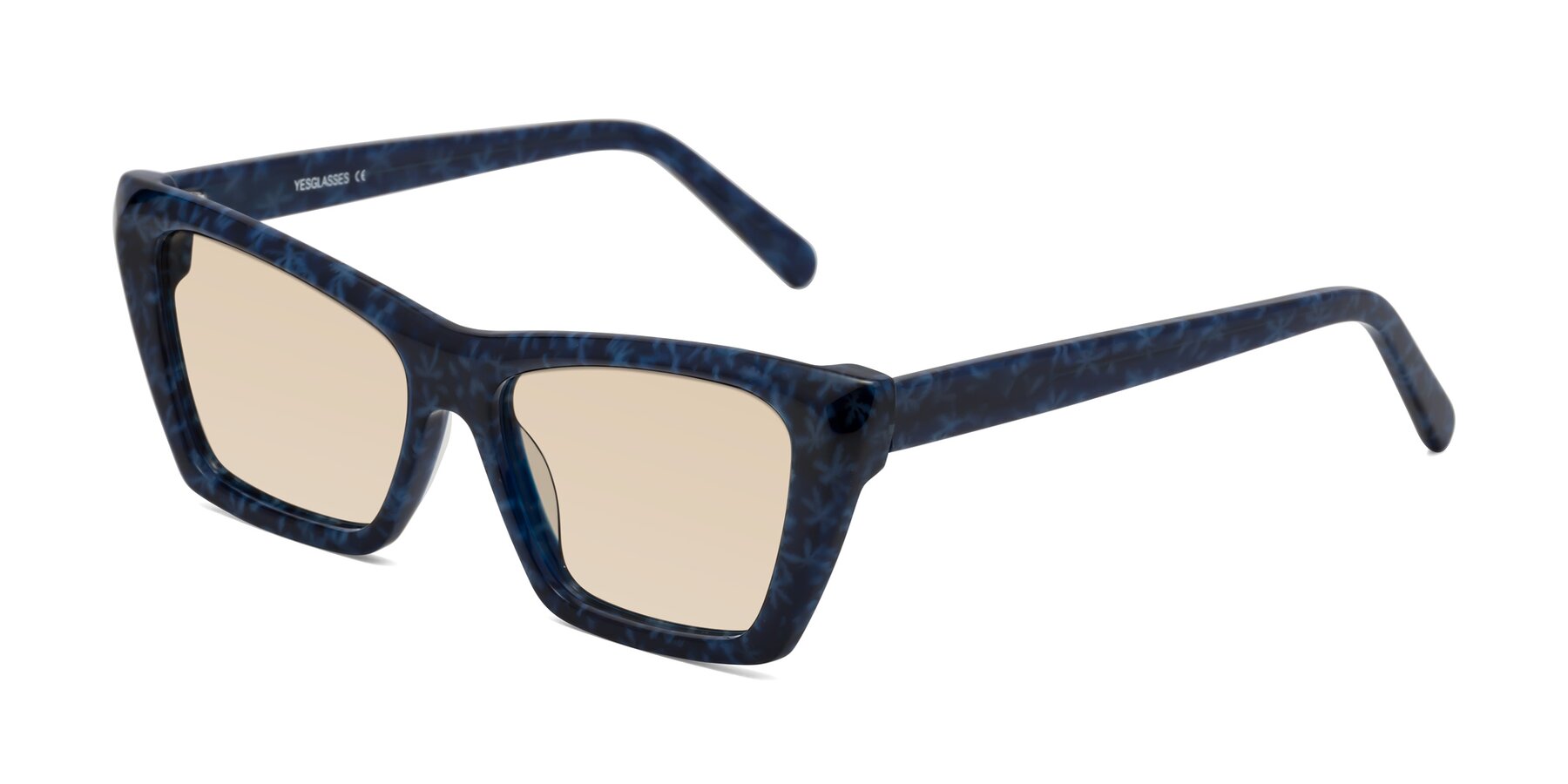 Angle of Khoi in Blue Snowflake with Light Brown Tinted Lenses