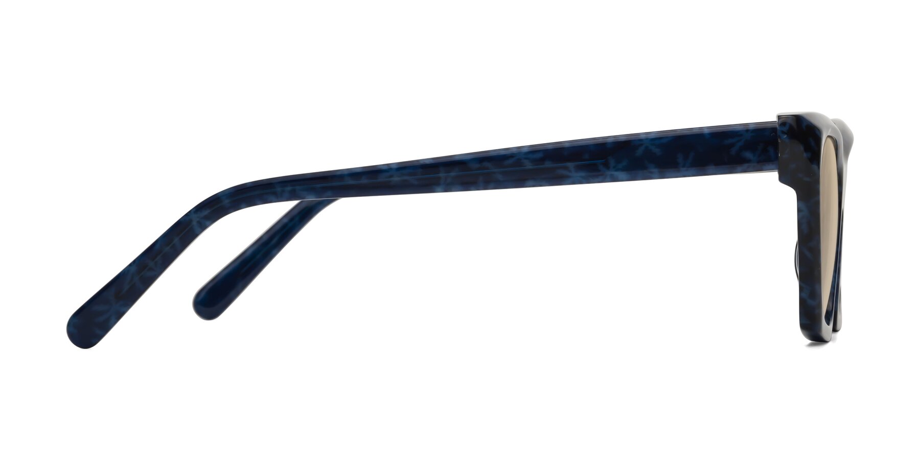 Side of Khoi in Blue Snowflake with Light Brown Tinted Lenses