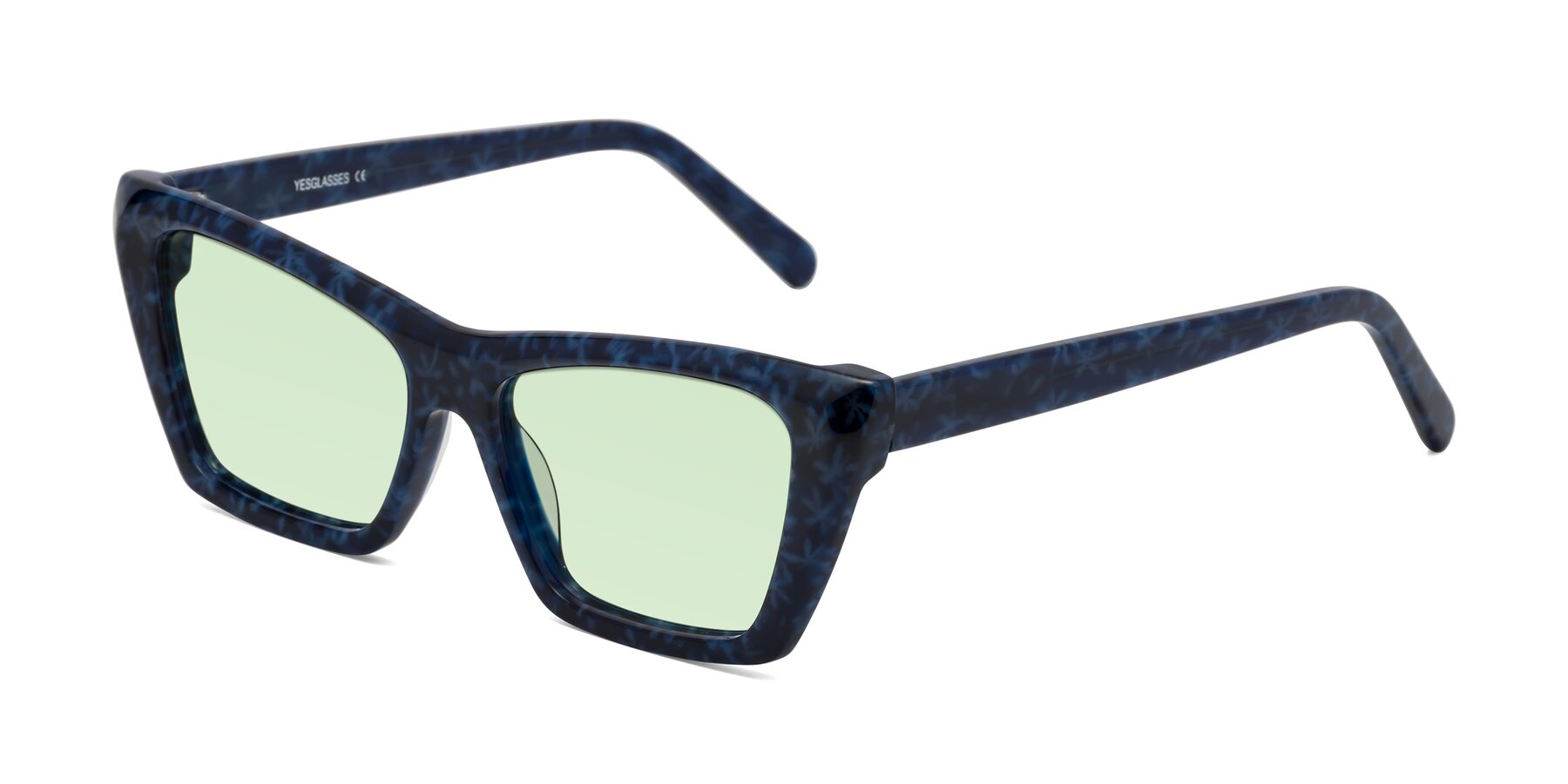Angle of Khoi in Blue Snowflake with Light Green Tinted Lenses