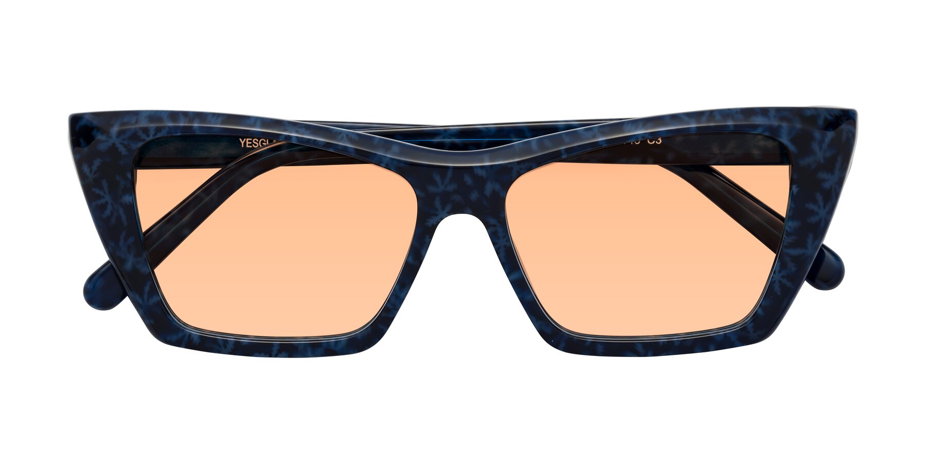 Folded Front of Khoi in Blue Snowflake with Light Orange Tinted Lenses