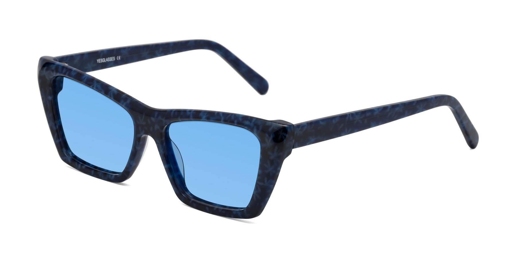 Angle of Khoi in Blue Snowflake with Medium Blue Tinted Lenses