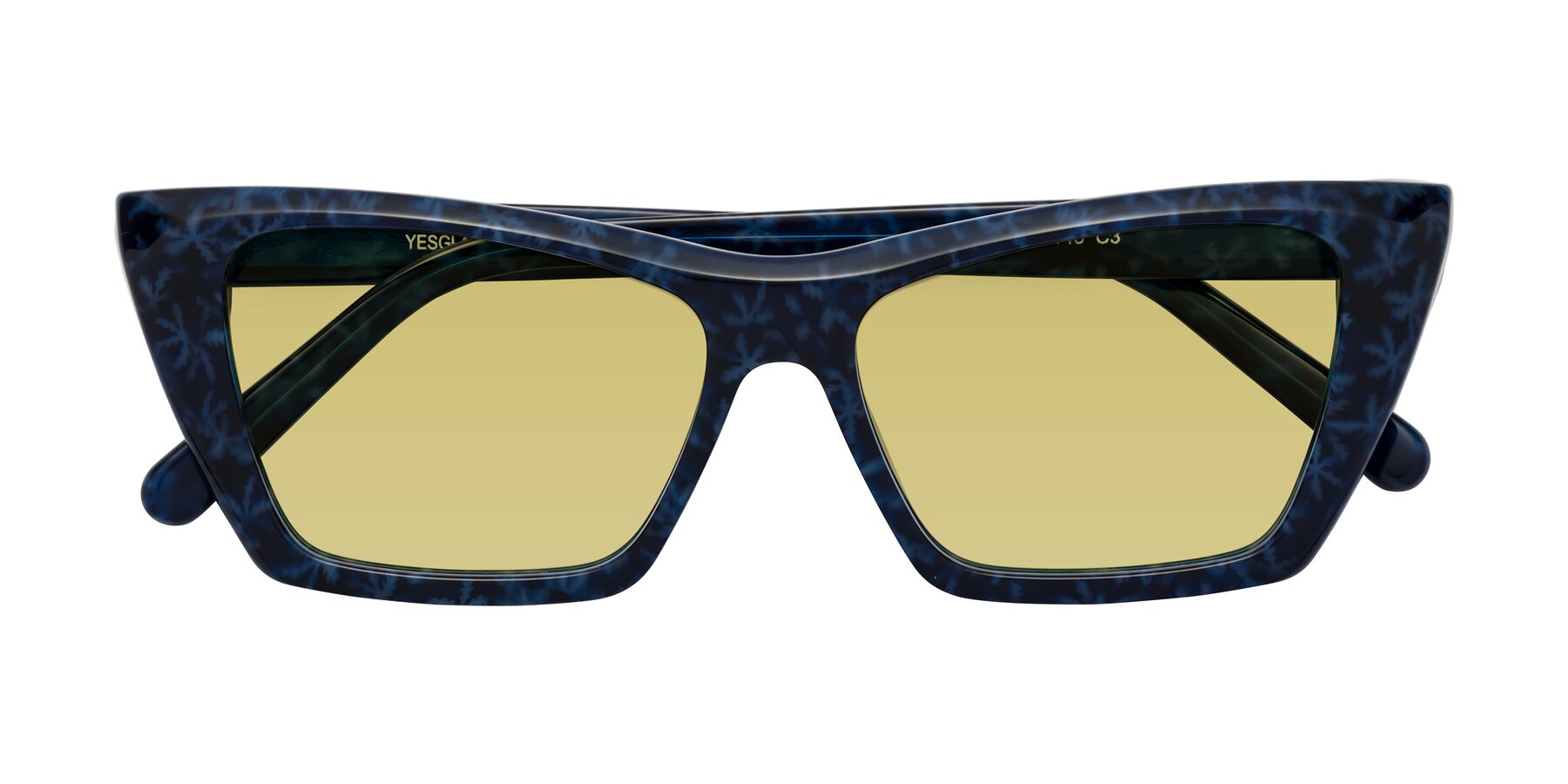 Folded Front of Khoi in Blue Snowflake with Medium Champagne Tinted Lenses