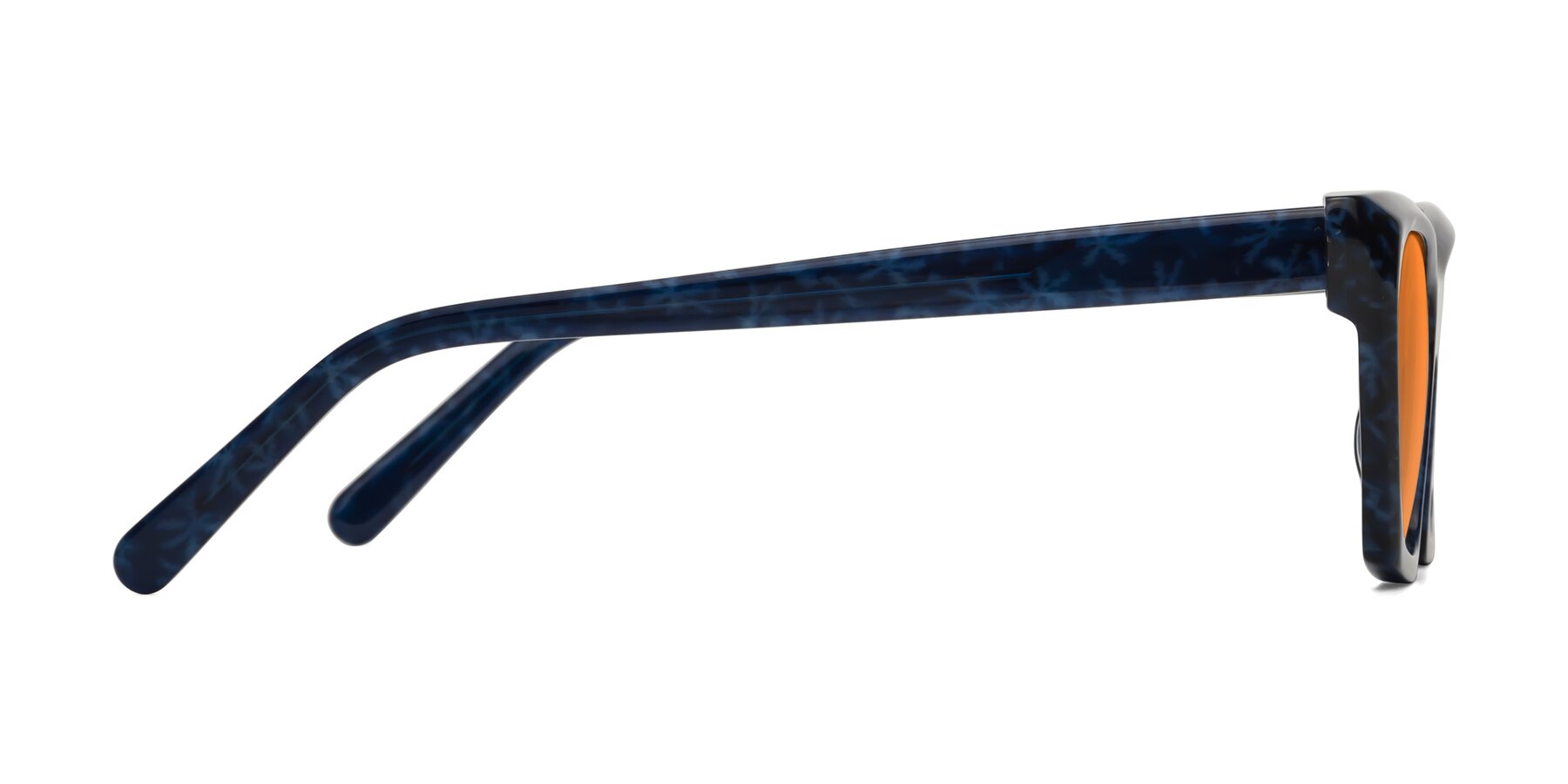 Side of Khoi in Blue Snowflake with Orange Tinted Lenses