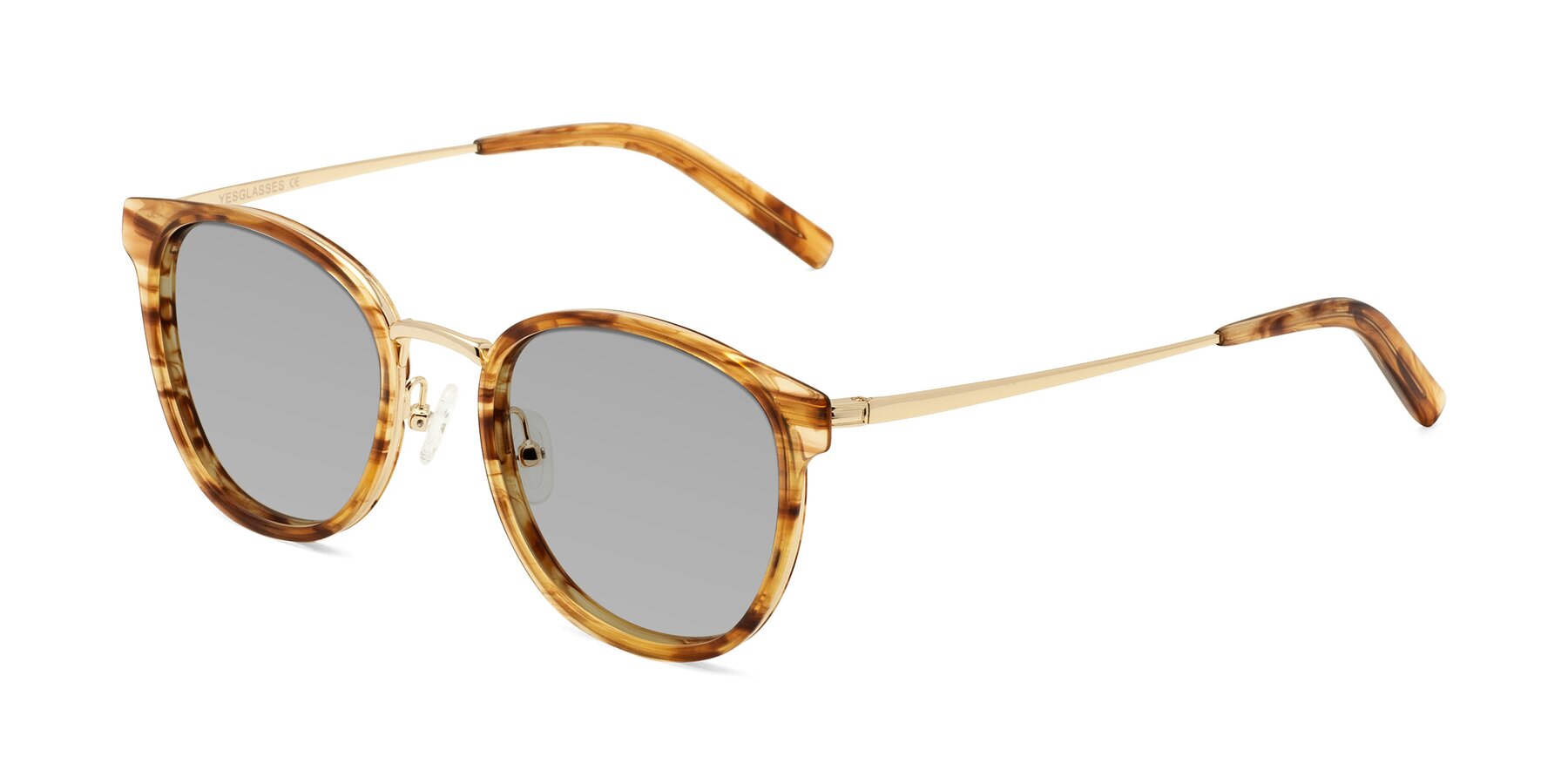 Angle of Callie in Amber Striped with Light Gray Tinted Lenses