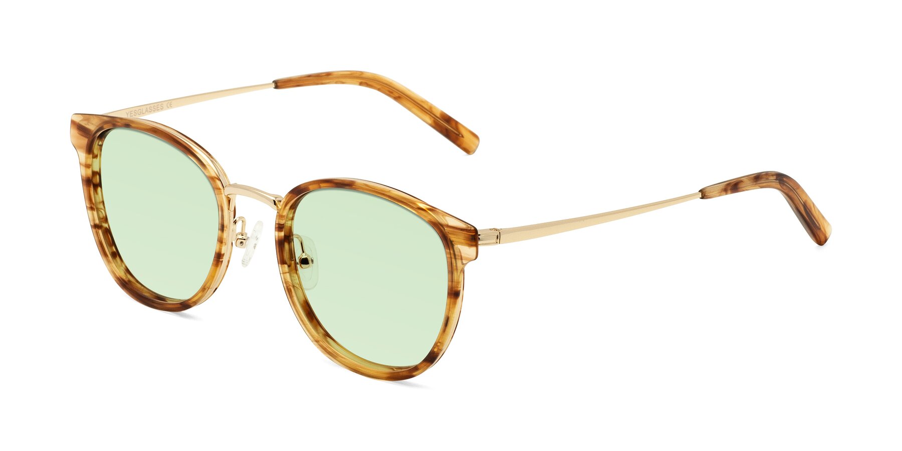 Angle of Callie in Amber Striped with Light Green Tinted Lenses