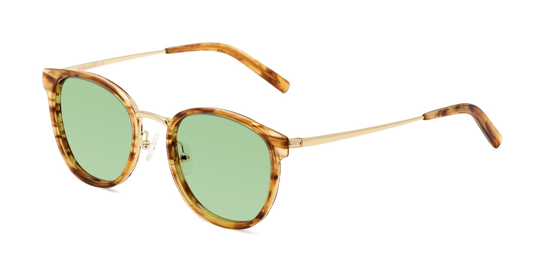 Angle of Callie in Amber Striped with Medium Green Tinted Lenses