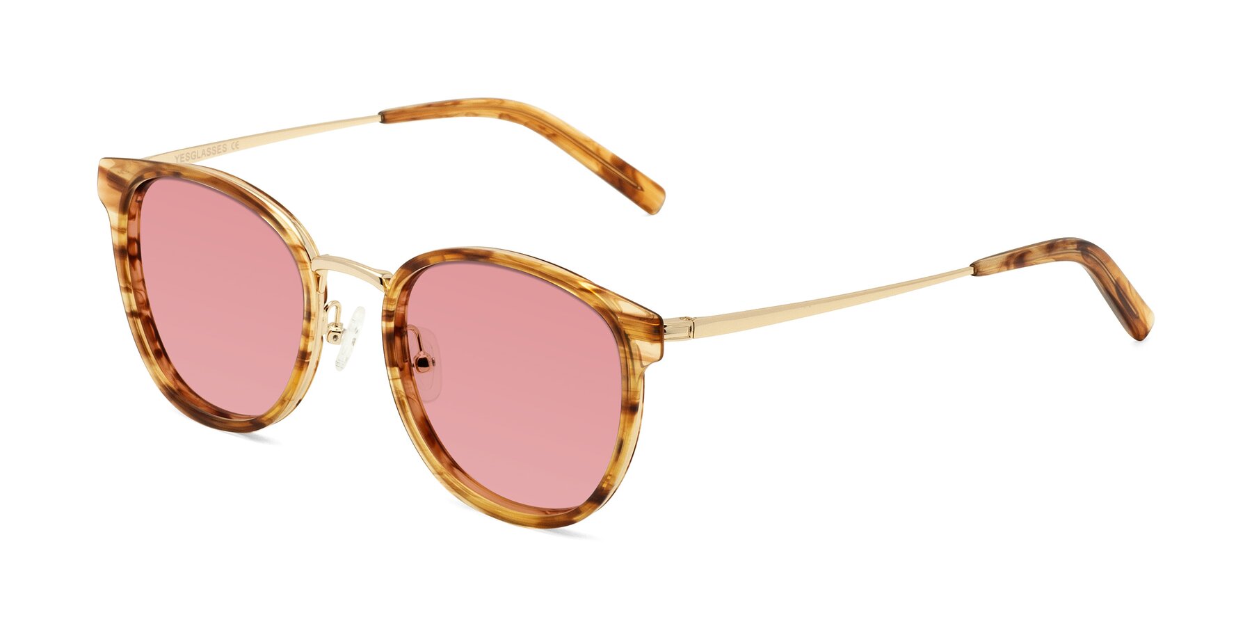 Angle of Callie in Amber Striped with Medium Garnet Tinted Lenses