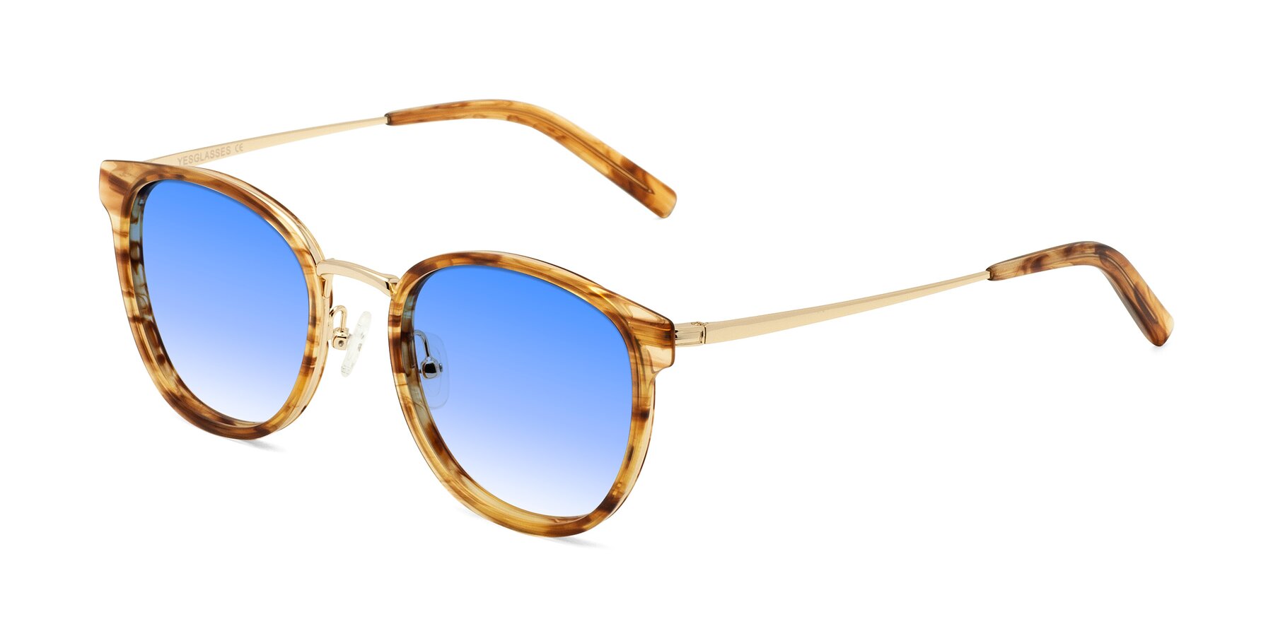Angle of Callie in Amber Striped with Blue Gradient Lenses