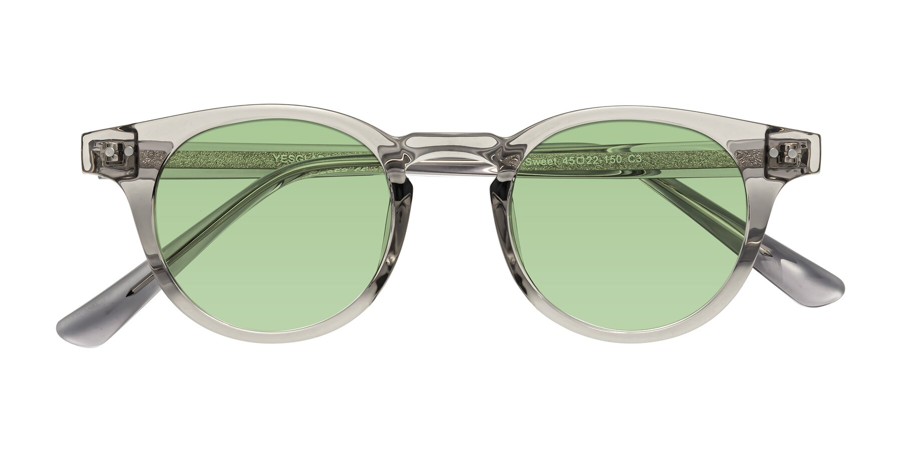 Folded Front of Sweet in Translucent Gray with Medium Green Tinted Lenses