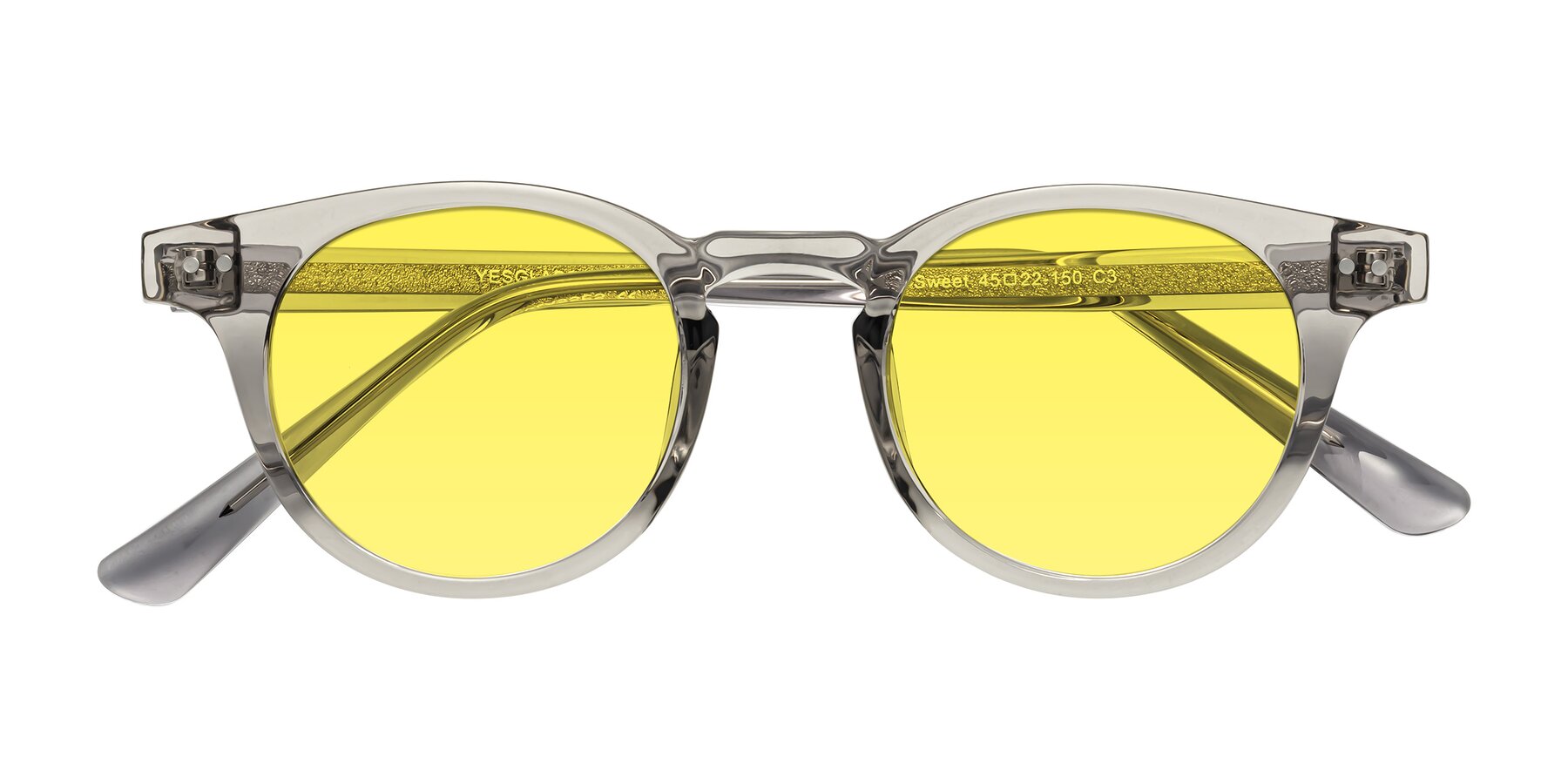 Folded Front of Sweet in Translucent Gray with Medium Yellow Tinted Lenses