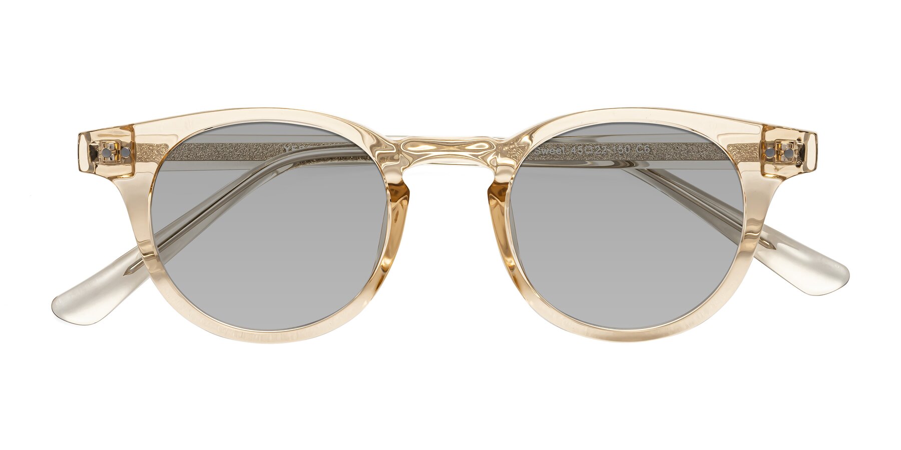 Folded Front of Sweet in Champagne with Light Gray Tinted Lenses