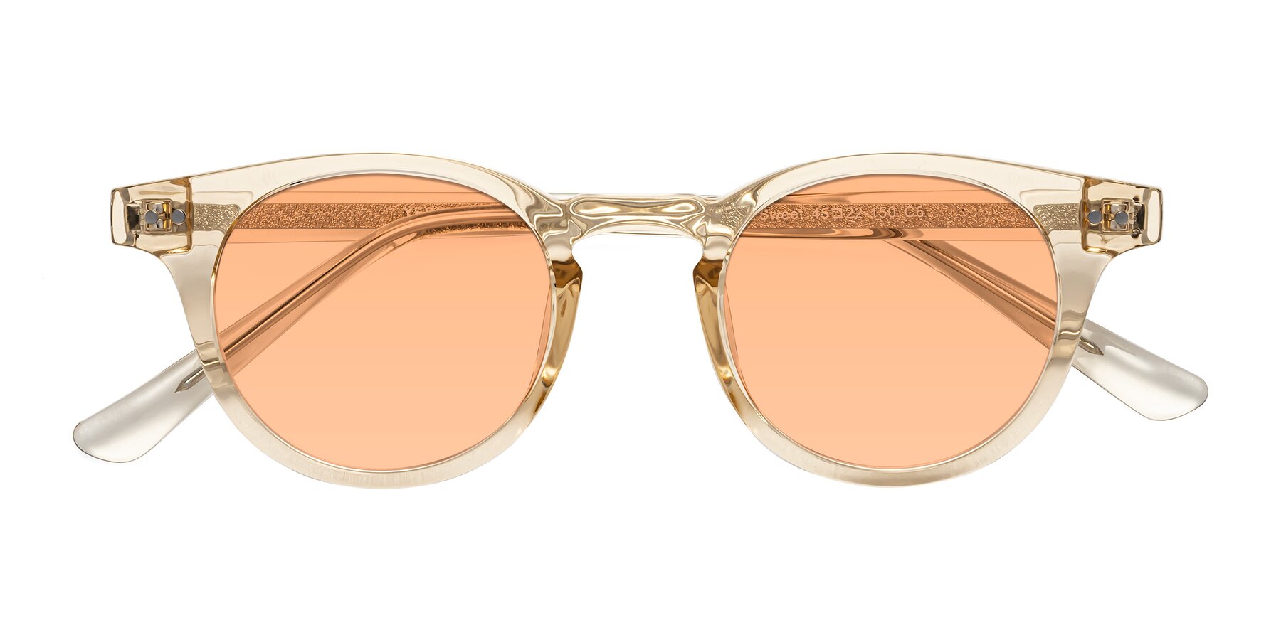 Folded Front of Sweet in Champagne with Light Orange Tinted Lenses