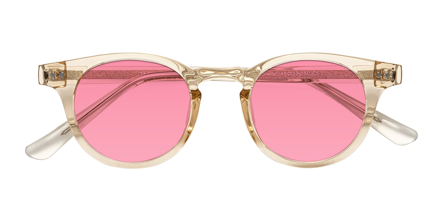 Folded Front of Sweet in Champagne with Pink Tinted Lenses