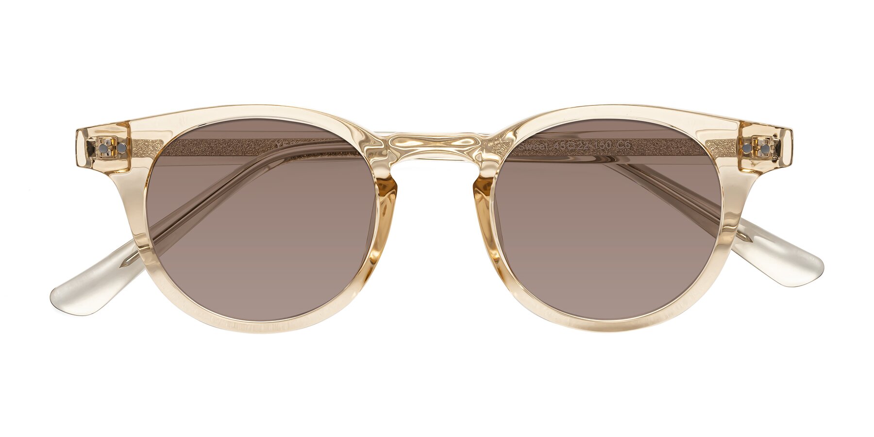 Folded Front of Sweet in Champagne with Medium Brown Tinted Lenses