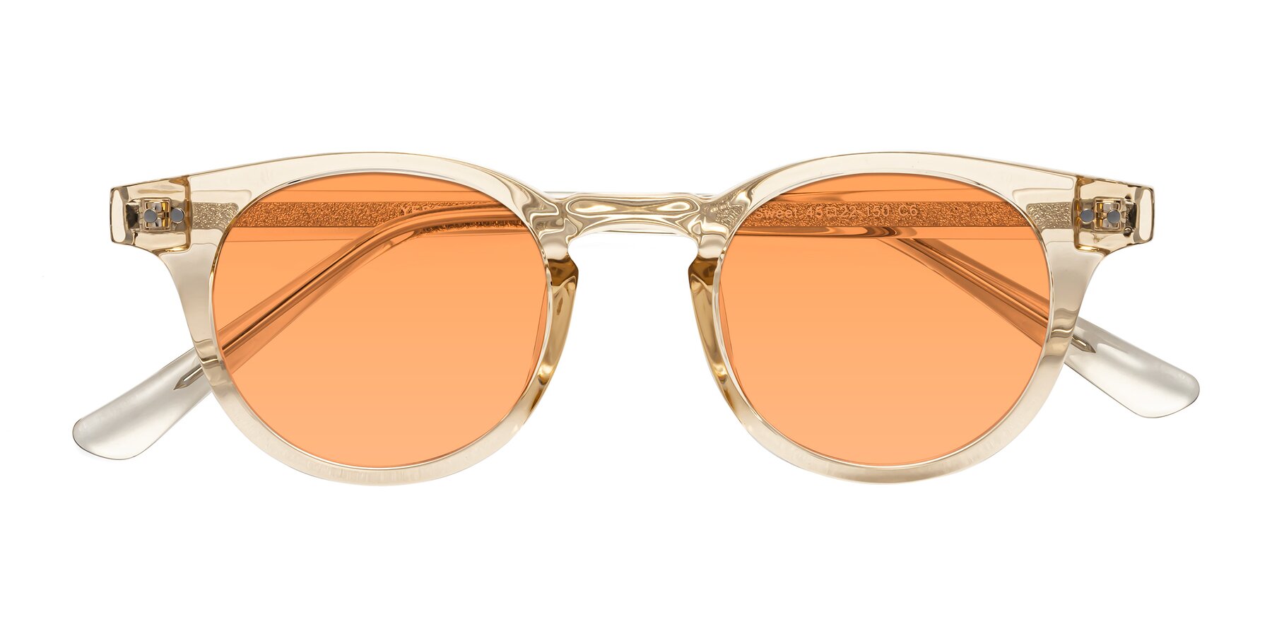 Folded Front of Sweet in Champagne with Medium Orange Tinted Lenses