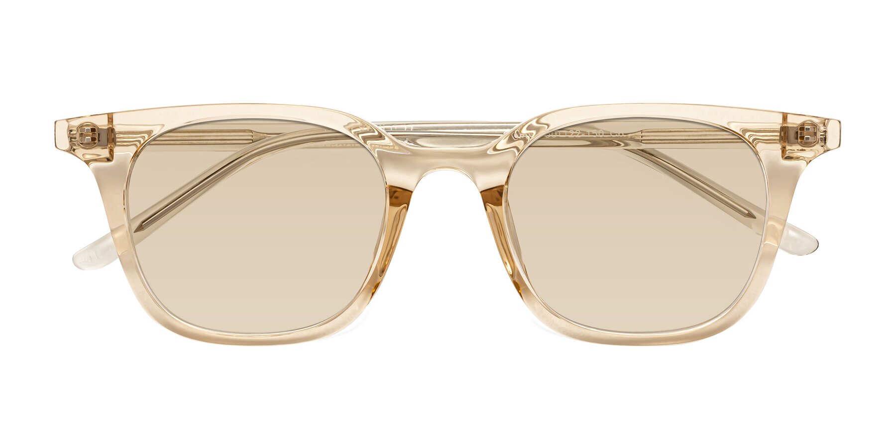 Folded Front of Gemini in Champagne with Light Brown Tinted Lenses