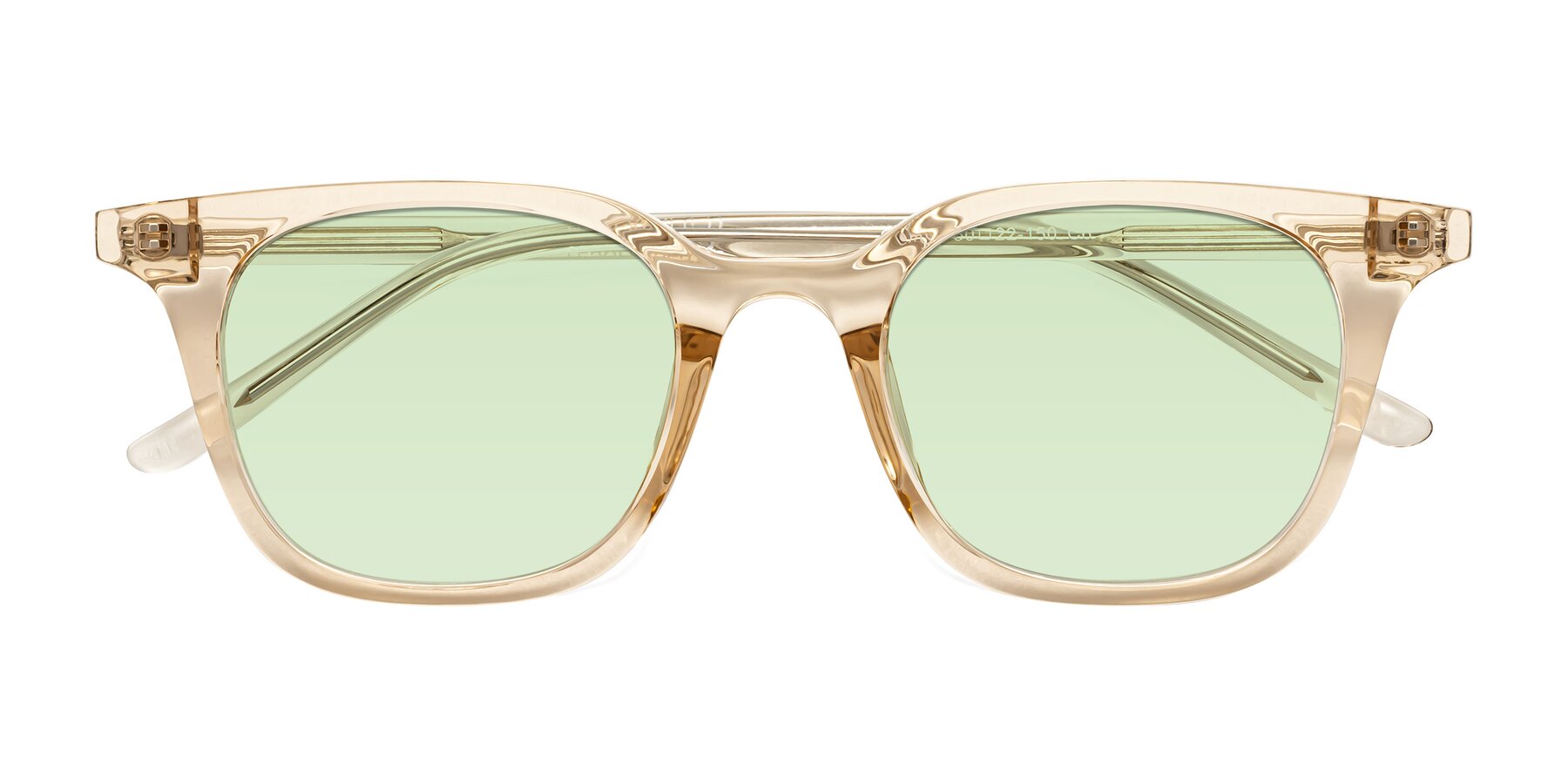 Folded Front of Gemini in Champagne with Light Green Tinted Lenses