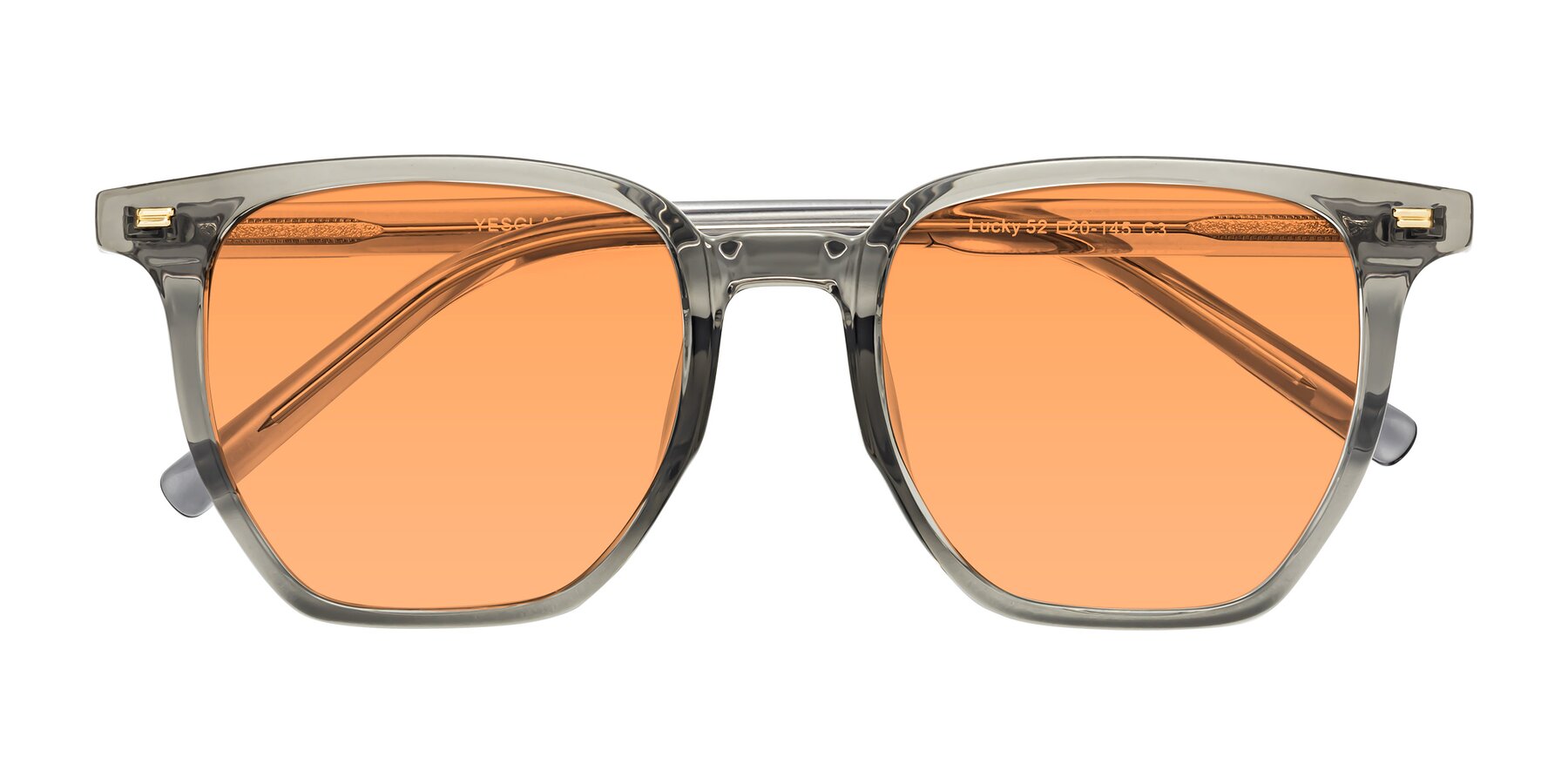 Folded Front of Lucky in Translucent Gray with Medium Orange Tinted Lenses