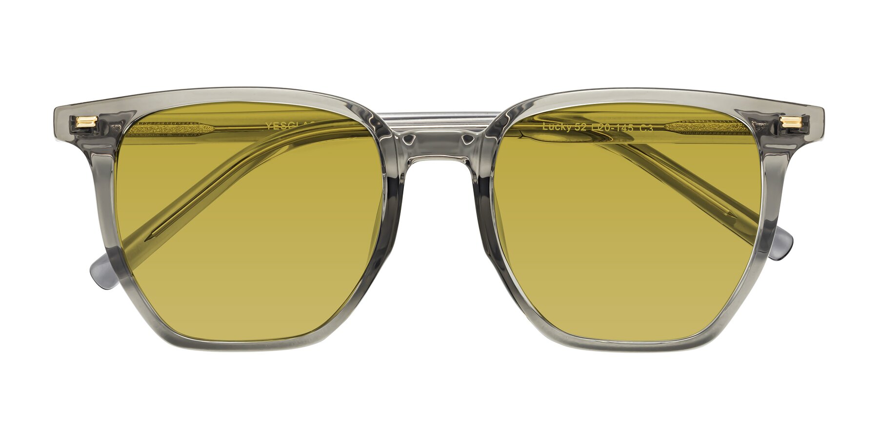 Folded Front of Lucky in Translucent Gray with Champagne Tinted Lenses