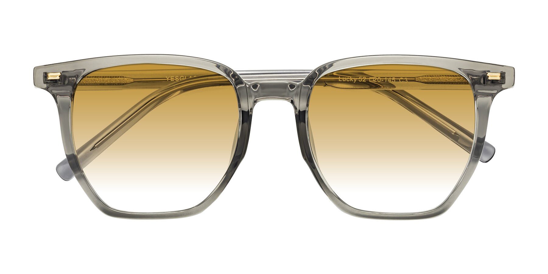 Folded Front of Lucky in Translucent Gray with Champagne Gradient Lenses