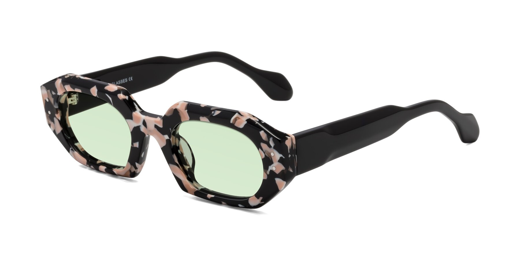 Angle of Molly in Pink Floral-Black with Light Green Tinted Lenses