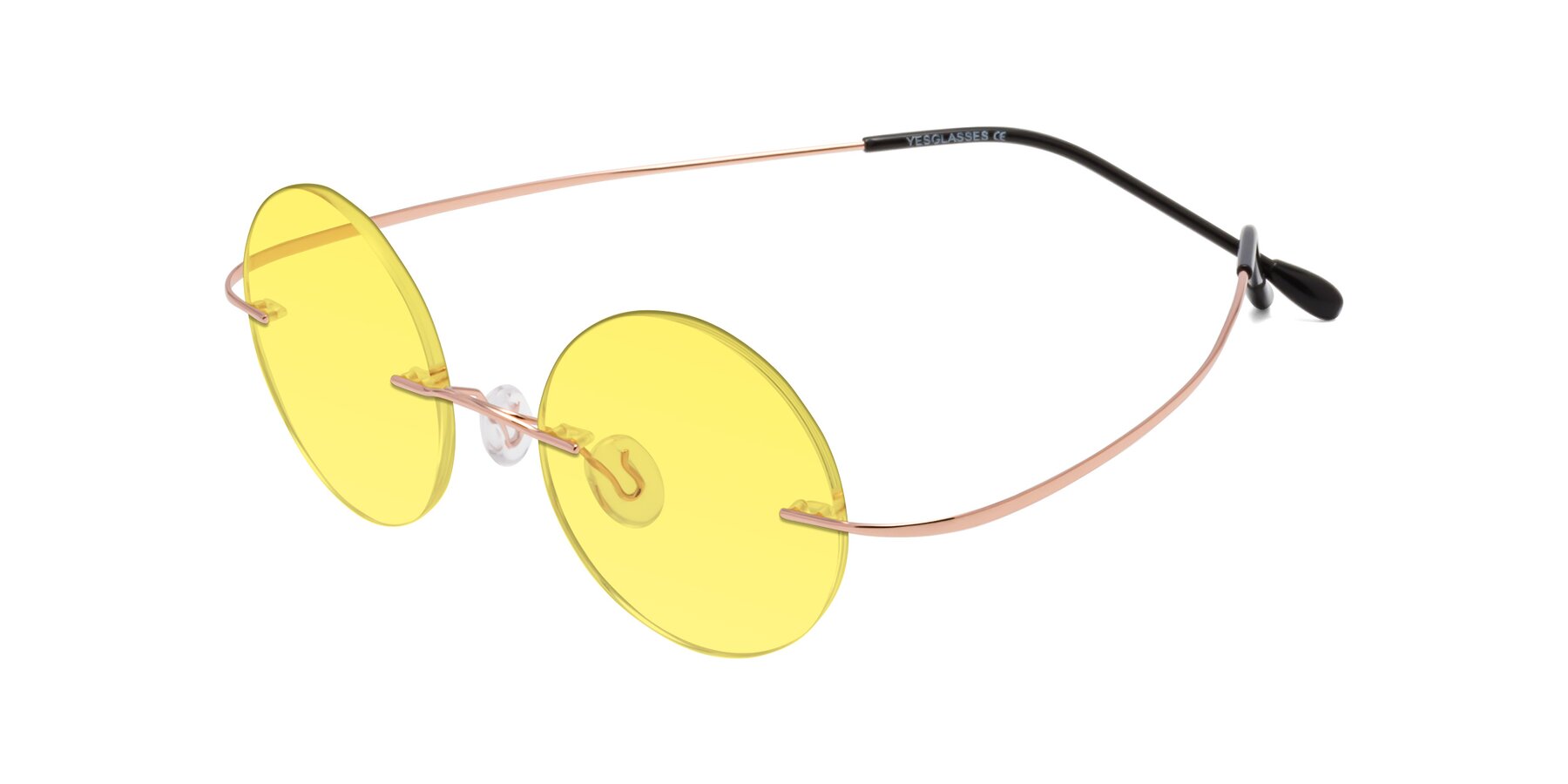 Angle of Minicircle in Rose Gold with Medium Yellow Tinted Lenses