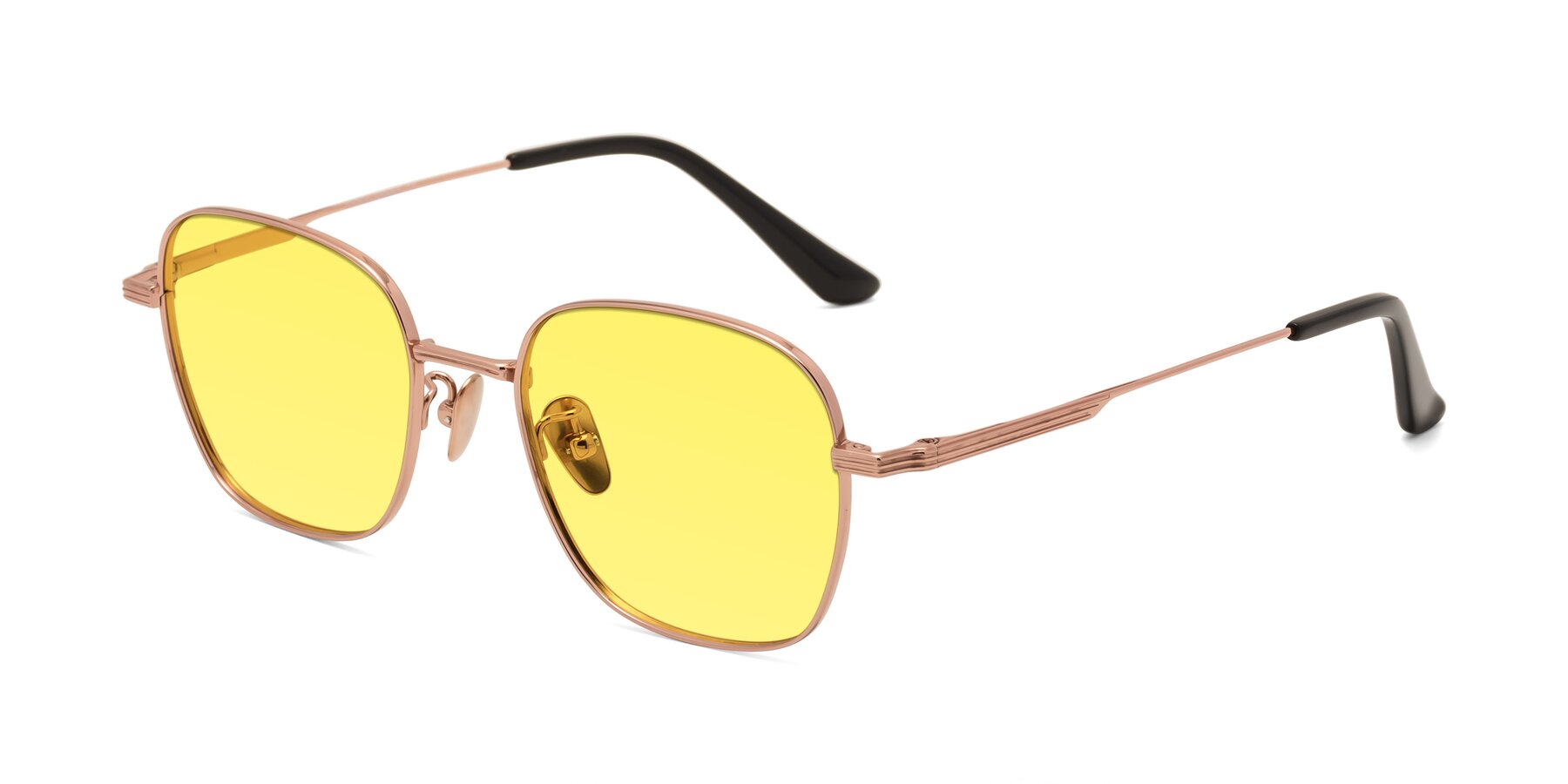 Angle of XING in Rose Gold with Medium Yellow Tinted Lenses