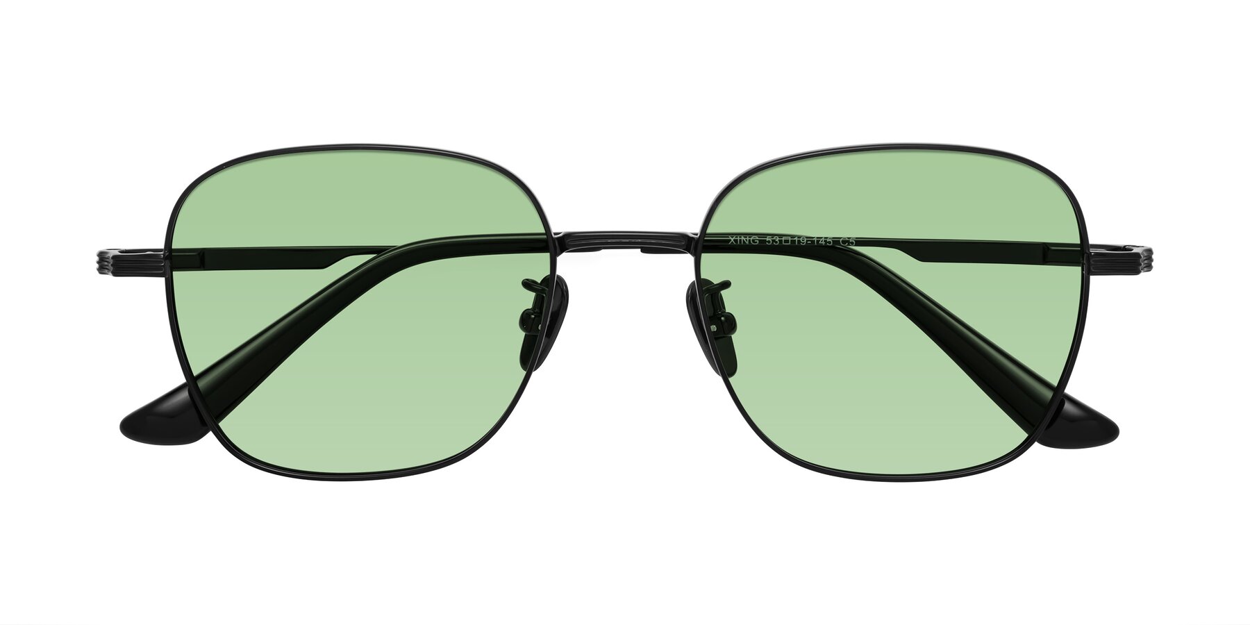 Folded Front of XING in Black with Medium Green Tinted Lenses