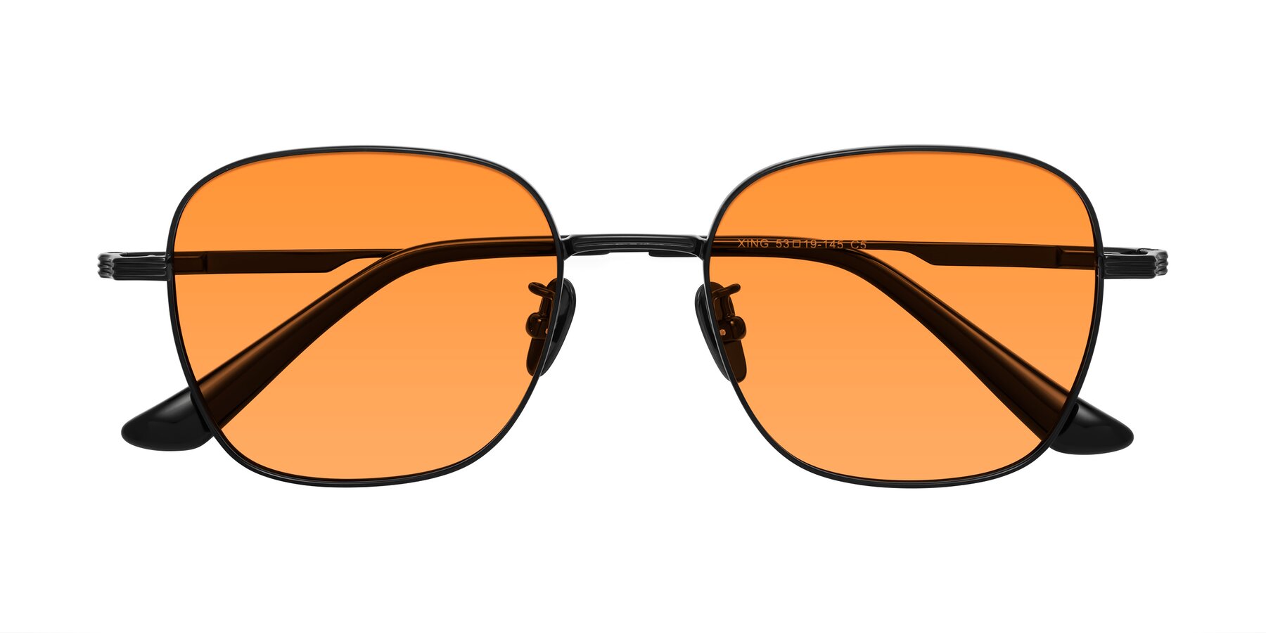 Folded Front of XING in Black with Orange Tinted Lenses