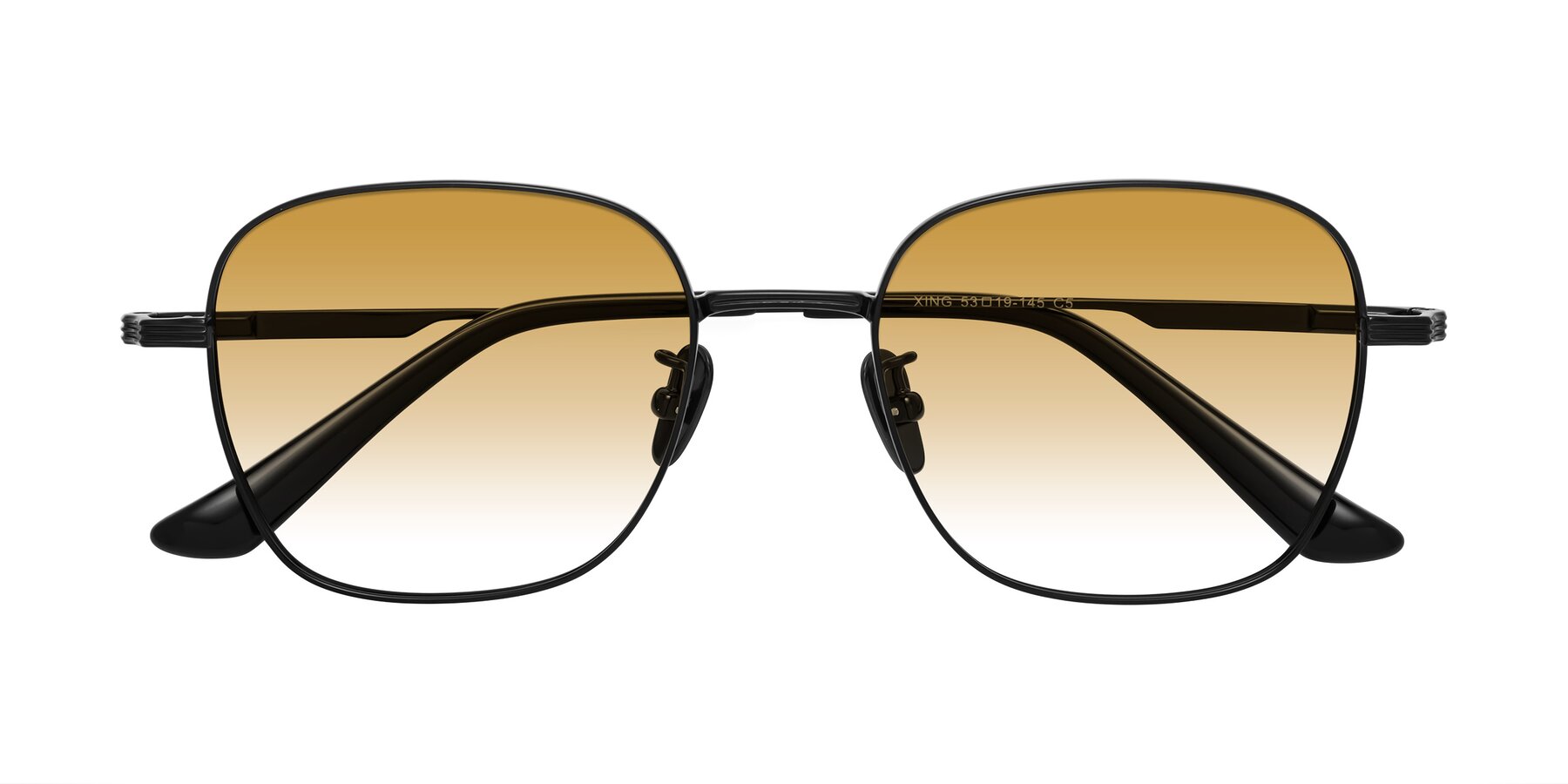 Folded Front of XING in Black with Champagne Gradient Lenses